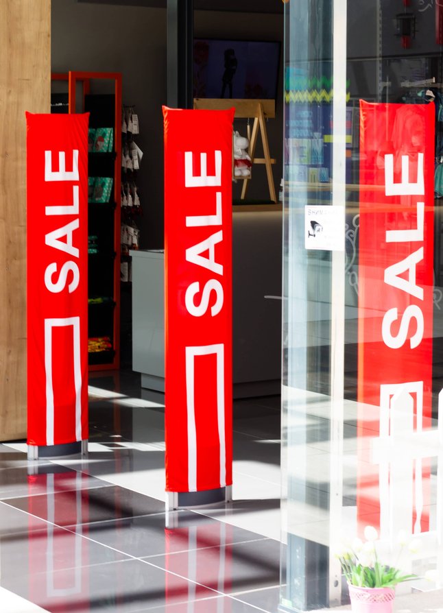 vibrant custom roll up banner standing on a city street