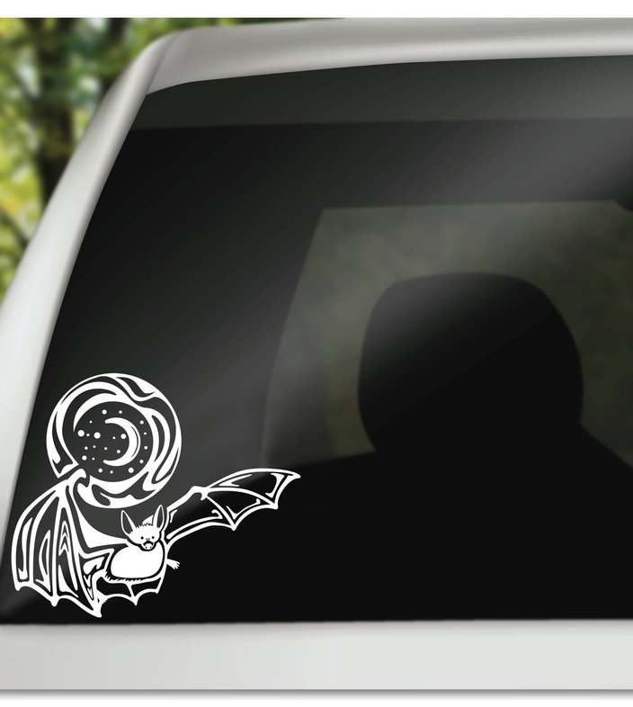 white bat and moon custom decal on a car window