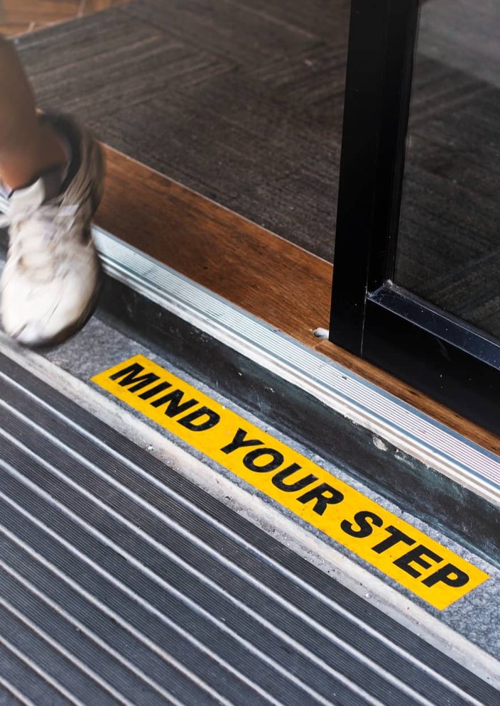 large custom banner printed on the side of a building